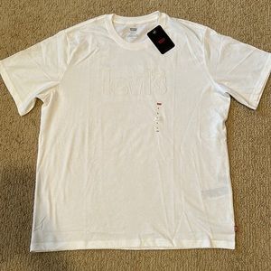 Levi’s white short sleeve T. Embroidered “levi’s” on front.